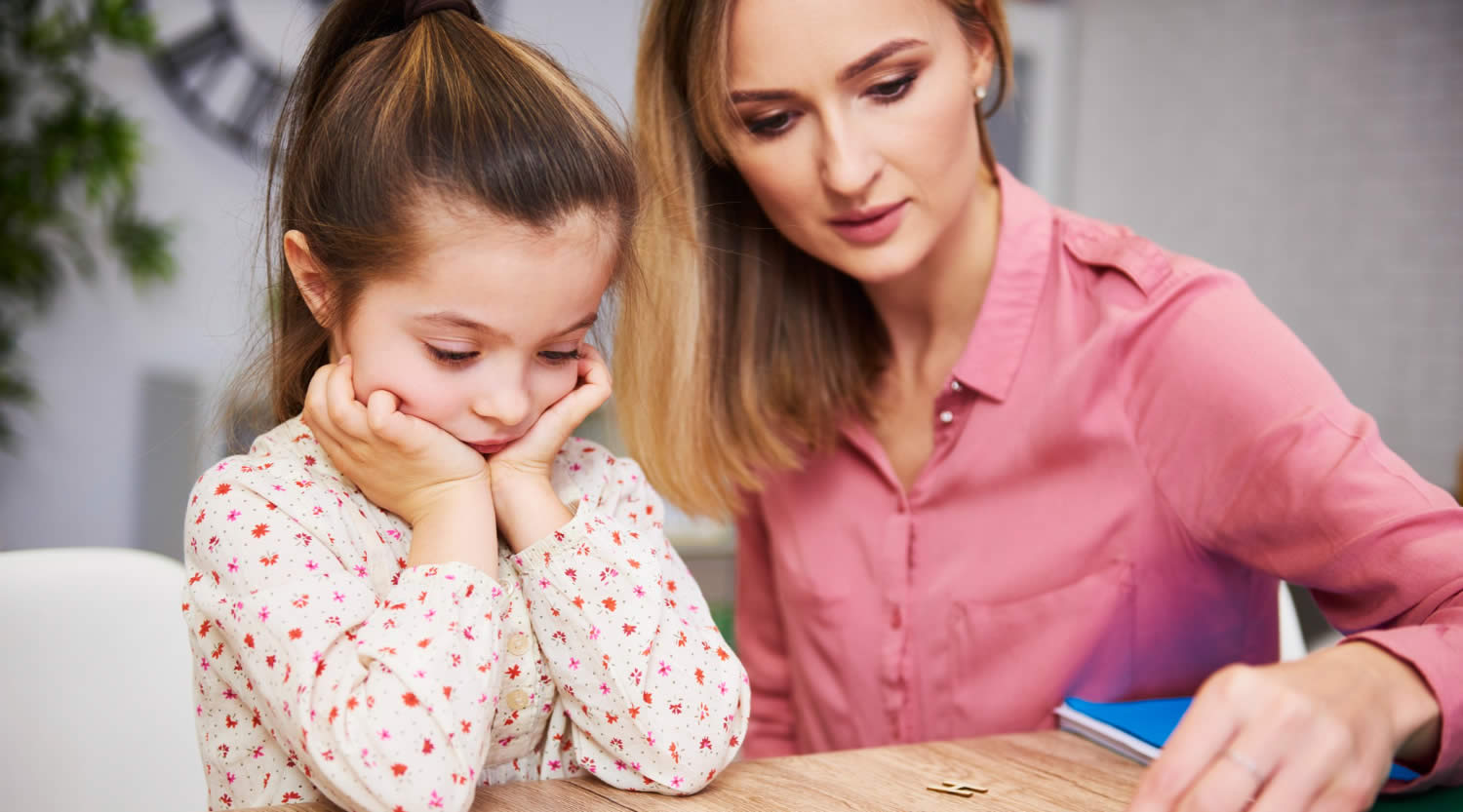 833-tired-bored-child-her-mother-studying-home